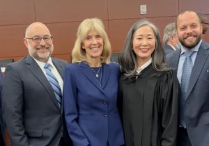 Photo of Ross Hartog, Trish Redmond, Judge Robson and Alan Rosenberg